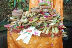 Altar piled with prayer offerings for Kuningan Day in Bali Indonesia