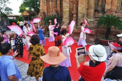 Tourists join traditional dancers at Po Nagar Cham Towers - Nha Trang, Vietnam