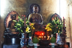 Altar inside shrine beneath Seated Buddha, Long Son Pagoda
