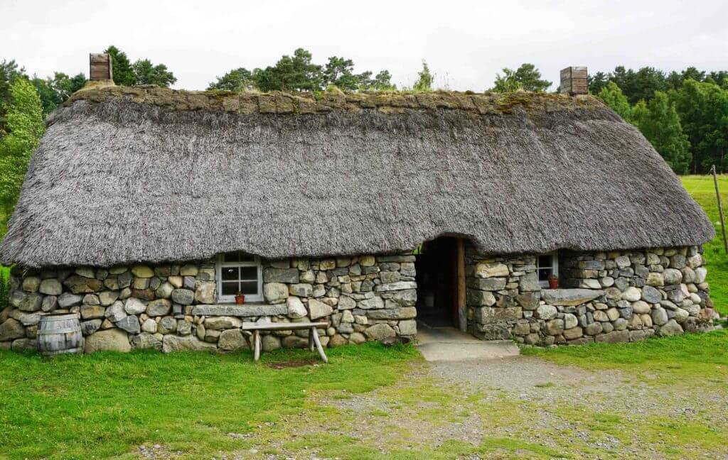 Traditional Scottish thatched-roof cottage