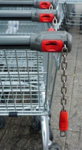 Chain attached to shopping cart handle