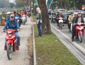 Sometimes Hanoi sidewalks become traffic lanes