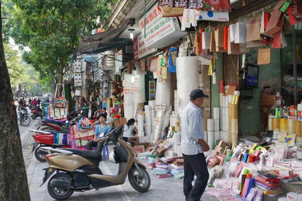 Typical busy sidewalk scene in Hanoi