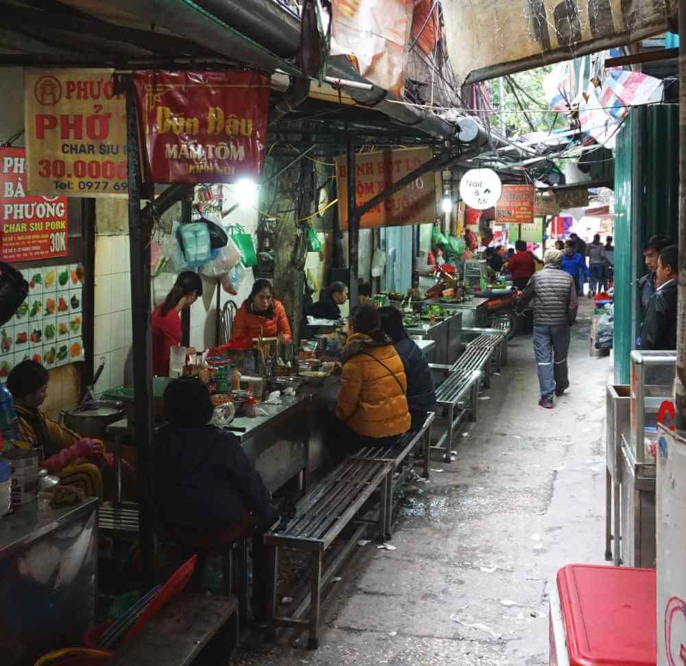 Food stalls in the local market serve a variety of ready-to-eat meals