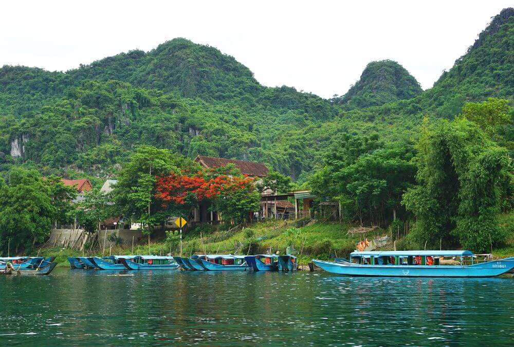 Tour boats on the Son River near Phong Nha, Vietnam