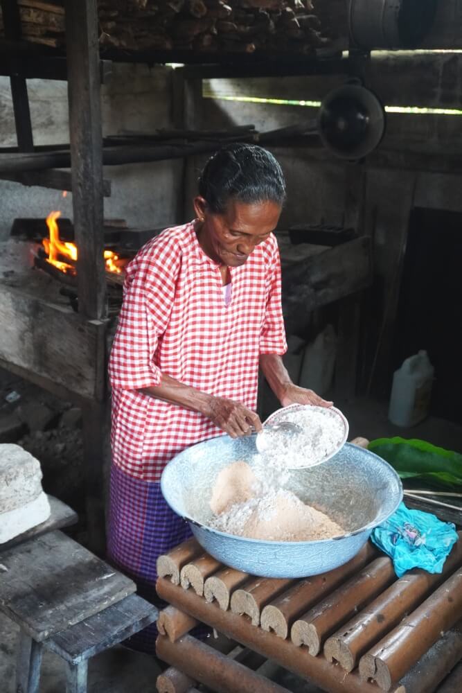 Freshly grated coconut is added to the sago flour to add moisture and sweetness