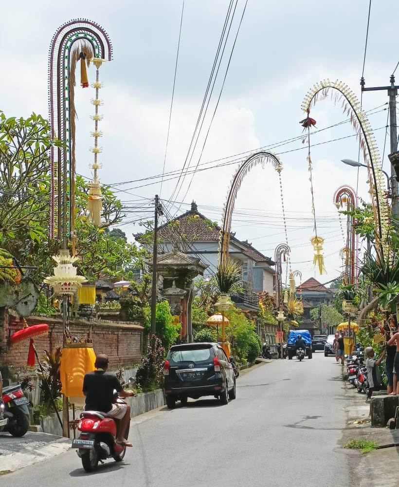 Penjors line the street in Bali Indonesia